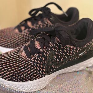 Ladies NIKE rainbow splash athletic shoes size 7.5. Only worn ONCE!